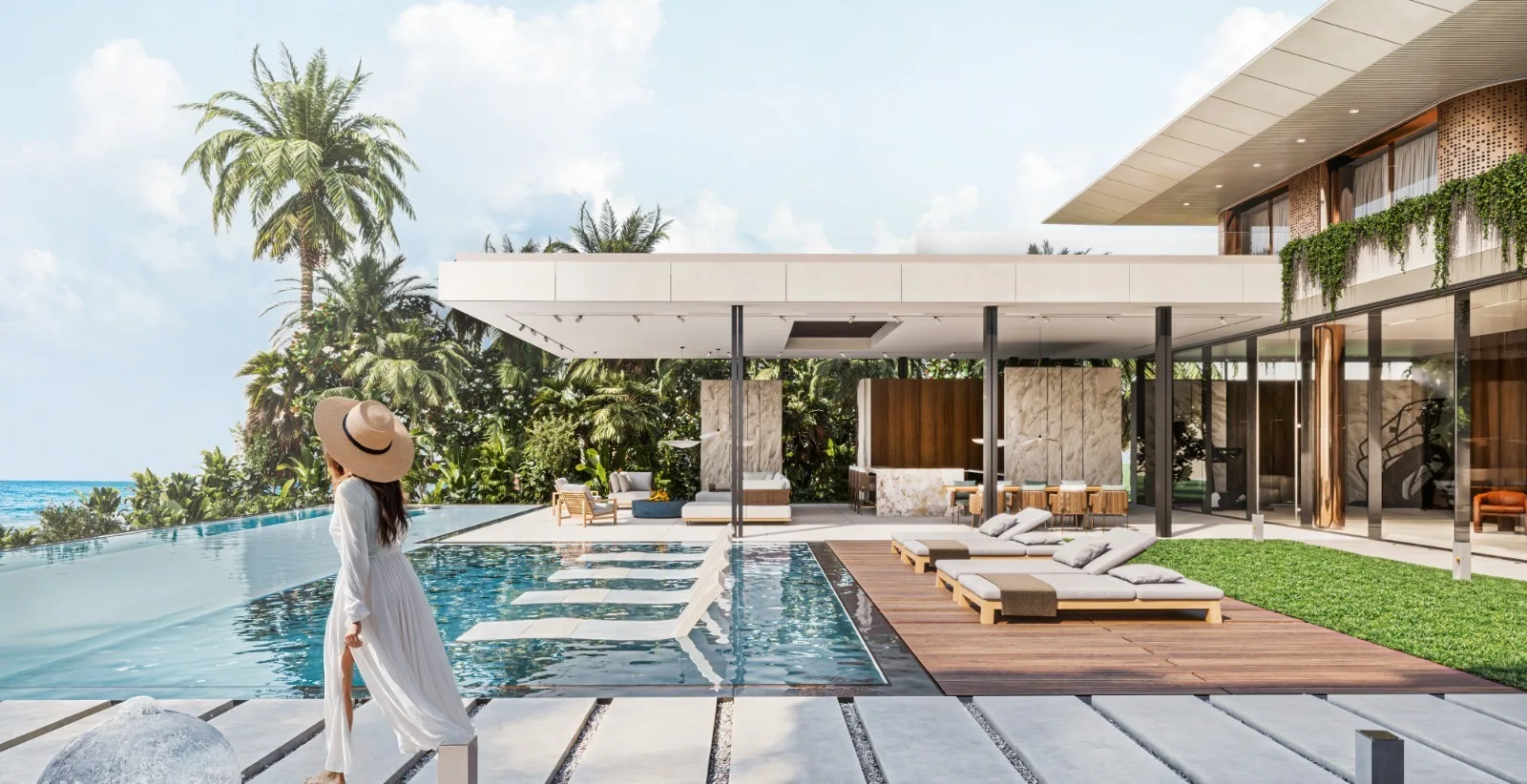 Infinity pool with modern hardscape design at a beachfront property.